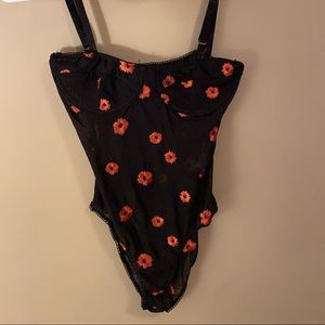 Black and floral sheer body suit